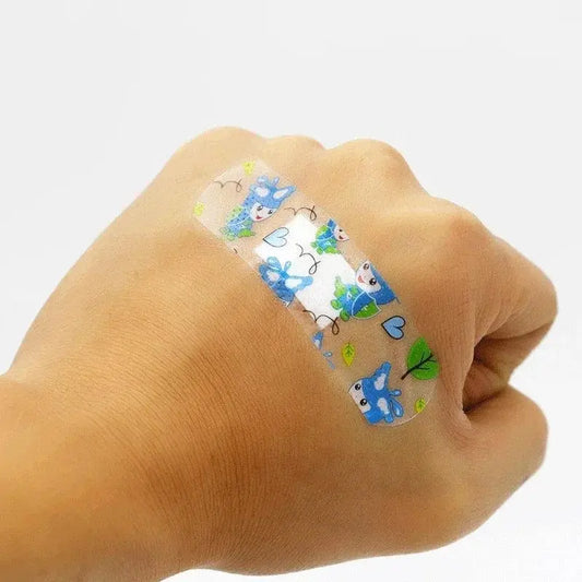 100pcs/lot Cartoon Patterned Curitas Adhesive Bandages Plaster Curved Patch Wound Strips Dressing Band Aid for Children Utensils - SS69