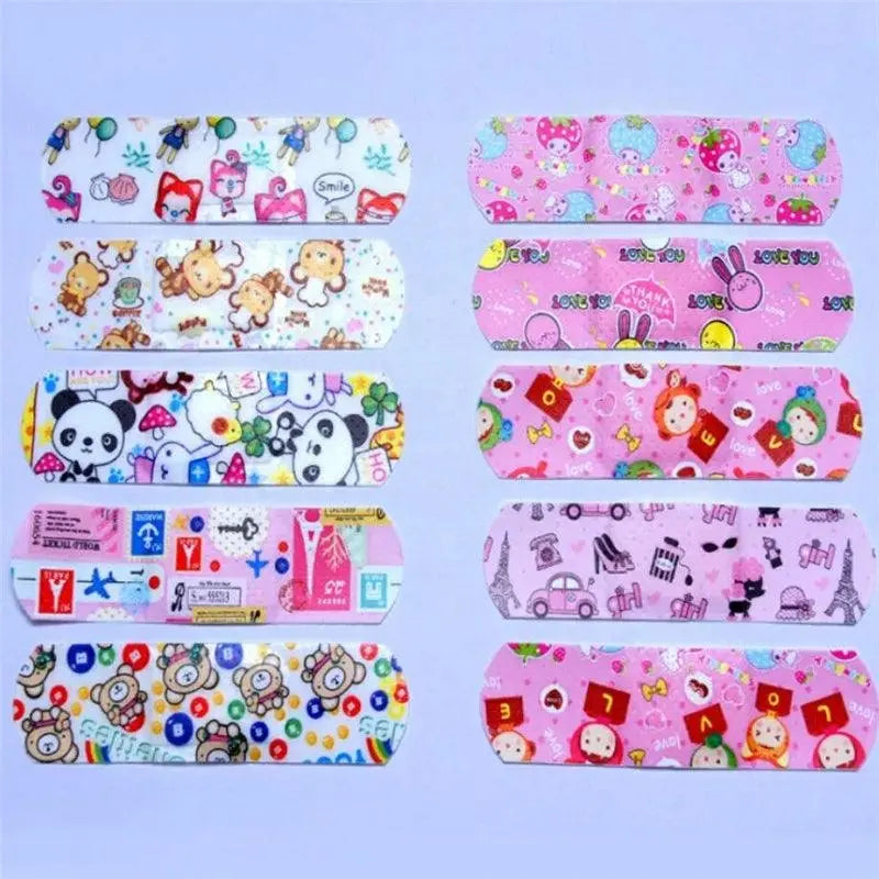 100pcs/lot Cartoon Patterned Curitas Adhesive Bandages Plaster Curved Patch Wound Strips Dressing Band Aid for Children Utensils - SS69