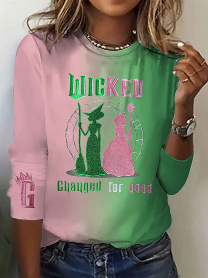 Plus-Size Women'S Wicked the Musical Inspired Graphic T-Shirt - Elphaba & Glinda Print, Gradient Green to Pink Long Sleeve Crew Neck, Comfortable Casual Fall Winter Tops, Machine Washable Themed Party Outfit Casual Attire, Se