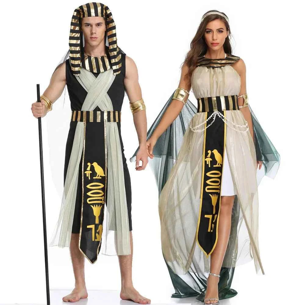 A man and woman posing in Egyptian Pharaoh and Queen costumes with gold and black accents.