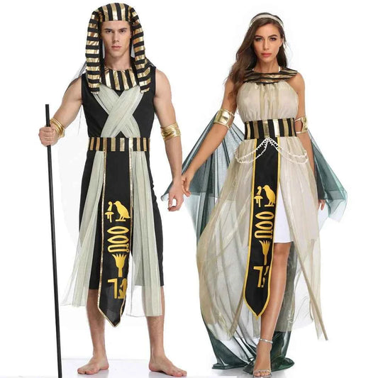 A man and woman posing in Egyptian Pharaoh and Queen costumes with gold and black accents.