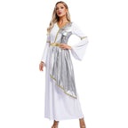 Woman in a white Greek goddess dress with silver metallic overlay, gold trim, and bell sleeves.