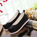 Black polyester Jinshi cosplay shoes from The Apothecary Diaries with white soles and black laces.