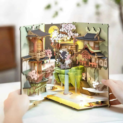 Robotime Rolife Falling Sakur Book Nook DIY Dollhouse Bookend Model Kit with LED Light Wooden Puzzle for Bookshelf Decor - TGB05