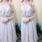 Women's white sleeveless chiffon fairy maxi dress with gold accessories and empire waist.