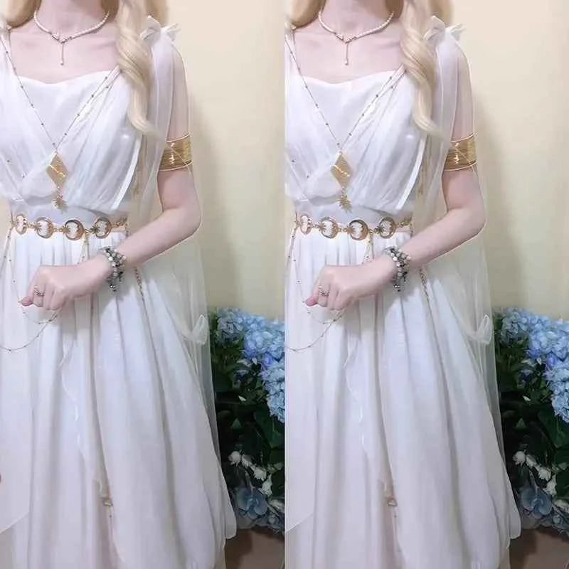 Women's white sleeveless chiffon fairy maxi dress with gold accessories and empire waist.