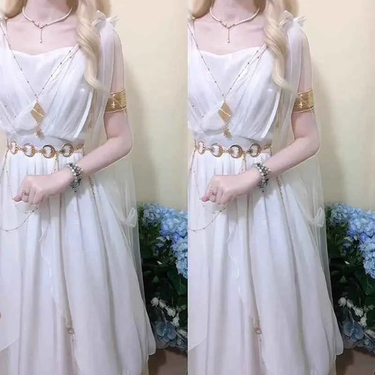 Women's white sleeveless chiffon fairy maxi dress with gold accessories and empire waist.