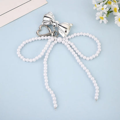 ZAKOL Y2K Korean Cute Beaded Pearl Bowknot Keychain for Women Girls Metal Bow Pendant Bag Decoration Accessories SS69 9.69 White set 2