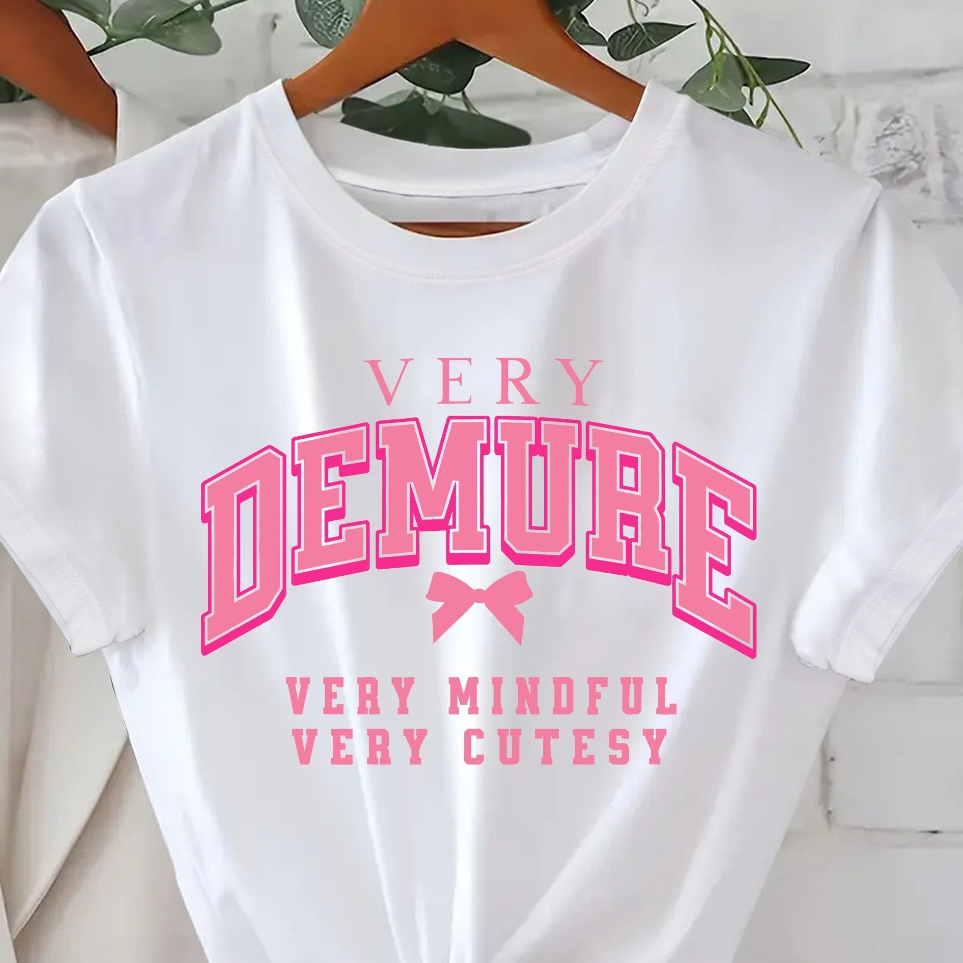 [Soft Graphic Tee] Soft Knit Women's Casual "Very Demure" Graphic Tee - Short Sleeve, Round Neck, Spring/Summer Fashion Top, White with Pink Print, Nontransparent Material, Bow Detail Shirt, Fitness Attire SS69 12.69 White / XXL