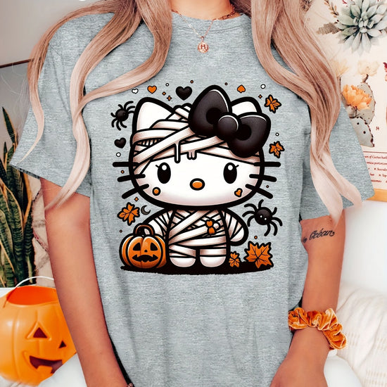 Sanrio Official Halloween Hello Kitty T-Shirt - Mummy Wrapped Graphic Tee with Orange Pumpkin, Casual Costume Party Outfit or Everyday Shirt for Women & Teens (S-XXL, Multi-Color Options) - Cute Sanrio Apparel, Halloween Clot SS69 15.69 Light Grey / XXL