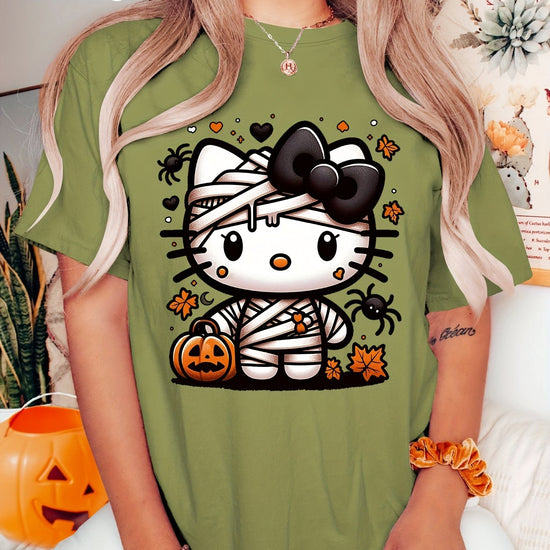 Sanrio Official Halloween Hello Kitty T-Shirt - Mummy Wrapped Graphic Tee with Orange Pumpkin, Casual Costume Party Outfit or Everyday Shirt for Women & Teens (S-XXL, Multi-Color Options) - Cute Sanrio Apparel, Halloween Clot SS69 16.69 Army Green / XXL