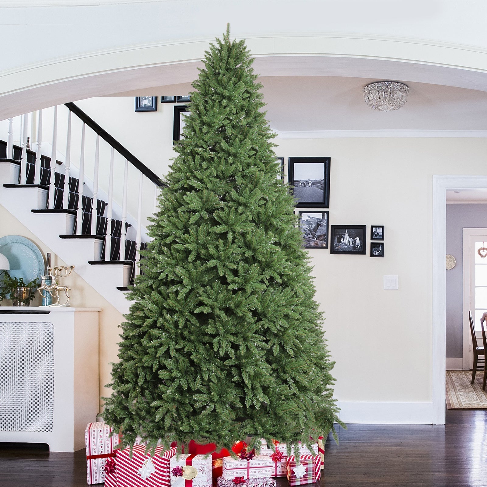 A 10-Foot Giant Pre-Lit Christmas Tree Featuring 5, 090 PVC Branches And a Sturdy Metal Stand, Perfect for Indoor Decoration. It Comes with 1, 200 Warm White Lights And 10 Colorful Modes, Suitable for Holiday Parties, Shops, SS69 324.69 Green / 10Ft - 5090tips - 1200lights