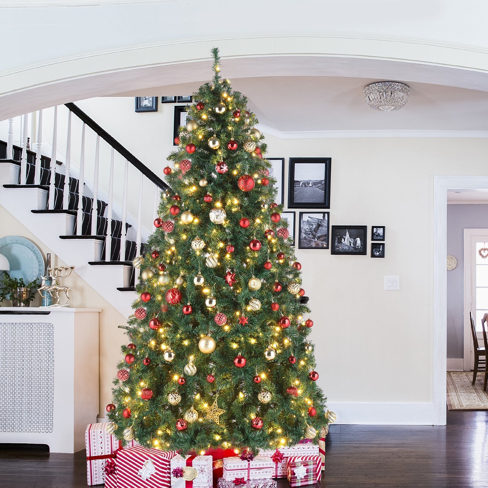 A 10-Foot Giant Pre-Lit Christmas Tree Featuring 5, 090 PVC Branches And a Sturdy Metal Stand, Perfect for Indoor Decoration. It Comes with 1, 200 Warm White Lights And 10 Colorful Modes, Suitable for Holiday Parties, Shops, SS69
